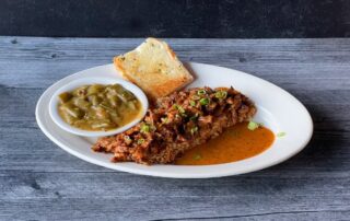 Grilled alligator tail with Cajun seasoning