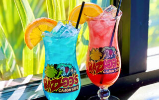 Colorful Mardi Gras style cocktails promotion
